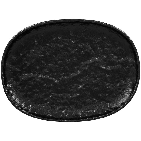 A black oval porcelain platter with a white background.