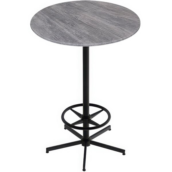 A round Holland Bar Stool EuroSlim bar height table with a metal base and a grey top.