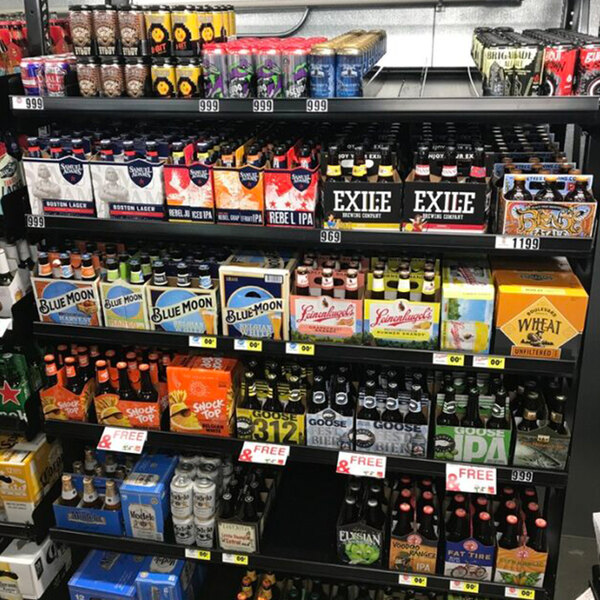 A VersaRack shelf full of beer and other beverages.