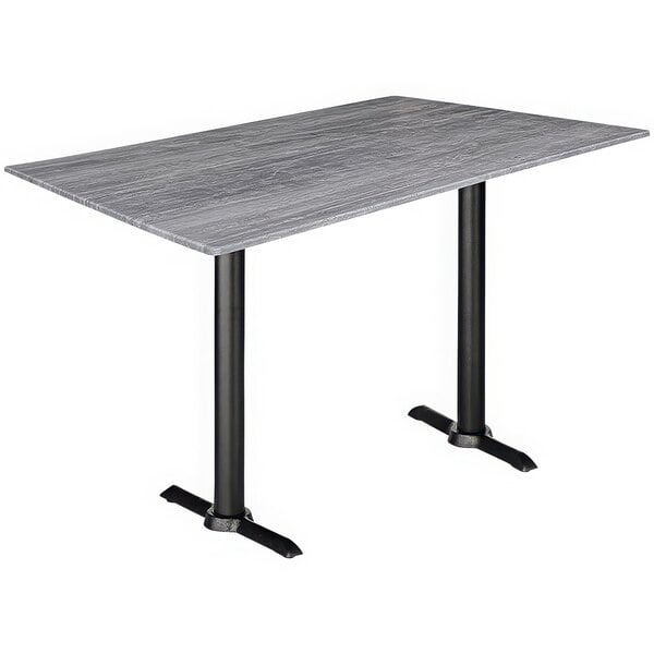 A Holland Bar Stool EuroSlim bar height table with a greystone top and black end column base.