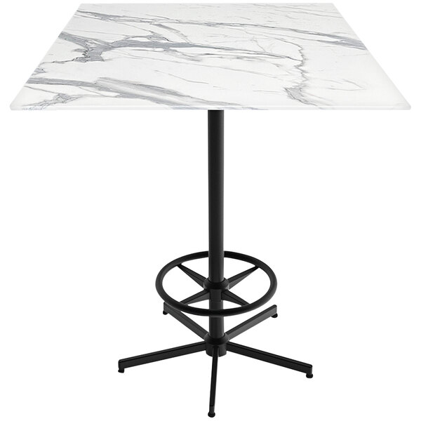 A Holland Bar Stool EuroSlim bar table with a white marble top and black foot rest base.