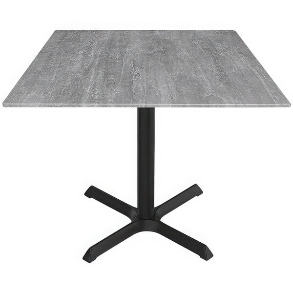 A Holland Bar Stool EuroSlim table with a black base and grey top.