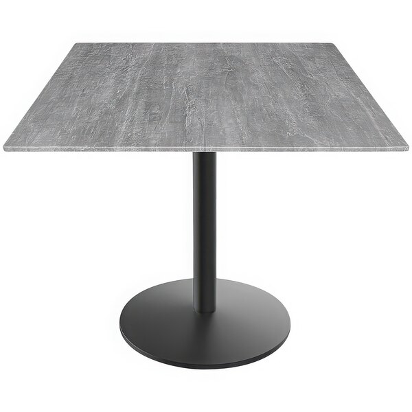 A Holland Bar Stool EuroSlim table with a greystone top and black base.