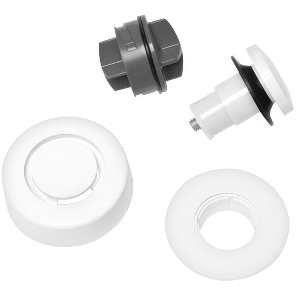 A white plastic and metal Dearborn touch toe stopper trim kit.