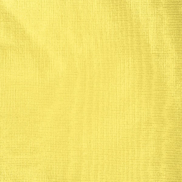 A white vinyl table cover with a yellow fabric background.
