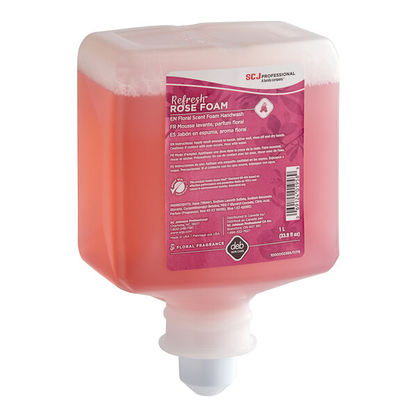 A bottle of SC Johnson Professional Rose Foaming Hand Soap with pink liquid.