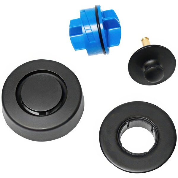 A group of black and blue Dearborn by Oatey plastic parts including a matte black circular trim piece with a blue circle in the middle.