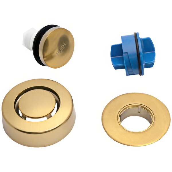 A brushed gold circular trim kit with a blue plastic touch toe stopper.