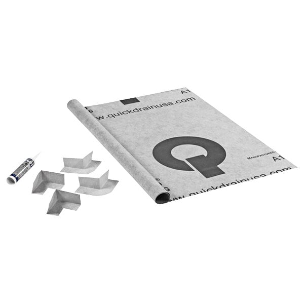 A white and grey QuickDrain membrane sheet with a black and white design.