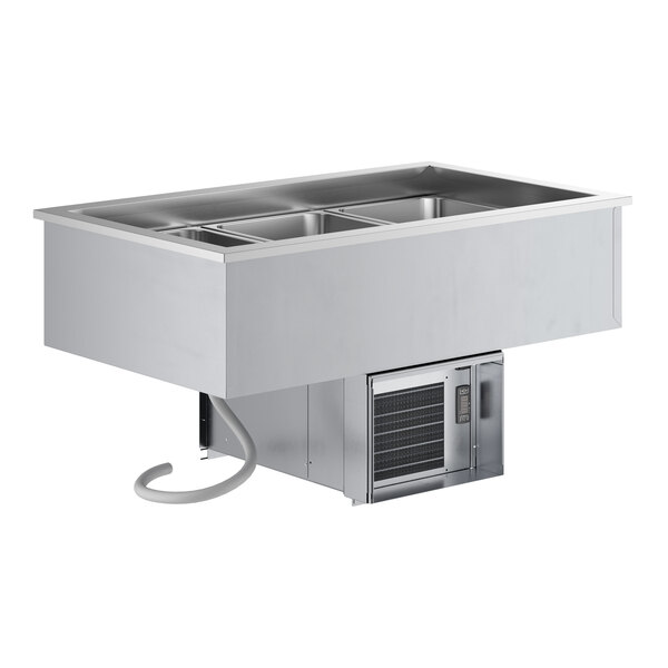 A ServIt stainless steel drop-in refrigerated cold food well with three pans on a counter.