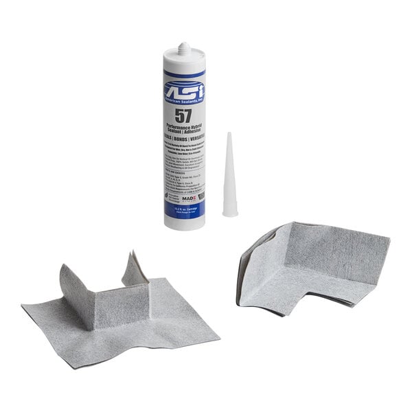 A QuickDrain membrane sheet kit with adhesive tape and glue.