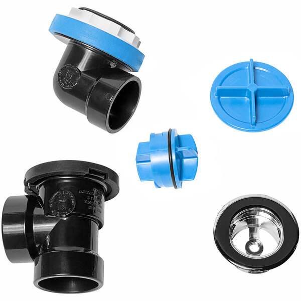 A group of black and blue plastic fittings including a black pipe with a black cap.