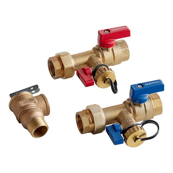 A group of brass valves with red and blue handles.