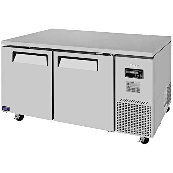 A stainless steel Turbo Air undercounter refrigerator with two drawers.