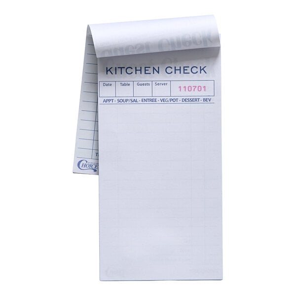A pad of green and white carbon guest checks used for kitchen orders in restaurants.