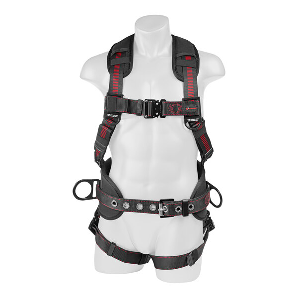 A mannequin wearing a black and red KStrong Kapture Epic full-body harness with quick connect legs.