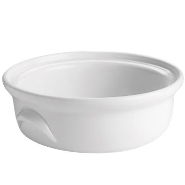A white Hall China casserole bowl with a lid.