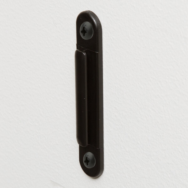 A black rectangular wall-mounted stanchion belt clip with a white border.