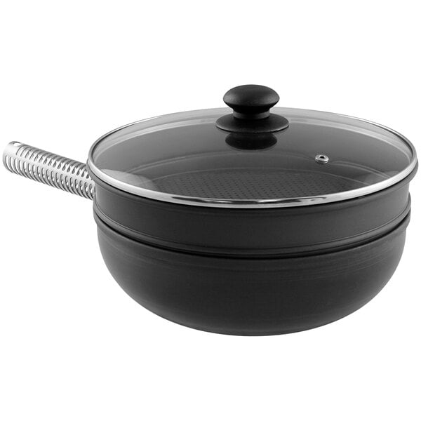 A black LloydPans stir fry pan with a glass lid.