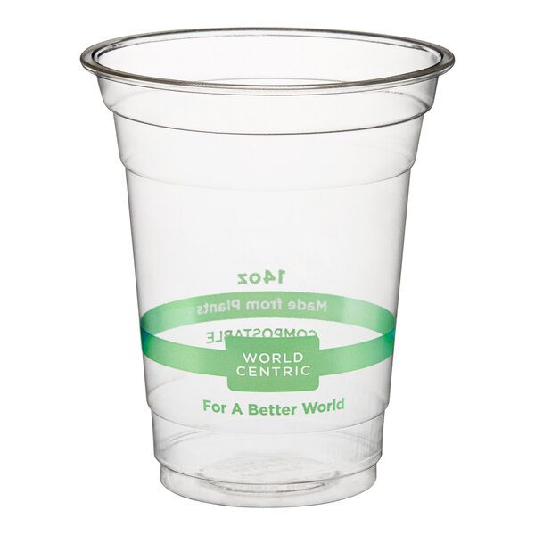 A clear 14 oz. compostable plastic cold cup with green labeling from World Centric.