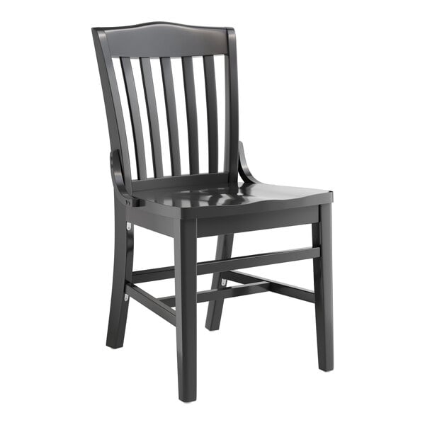 A Lancaster Table & Seating black wood school house chair.