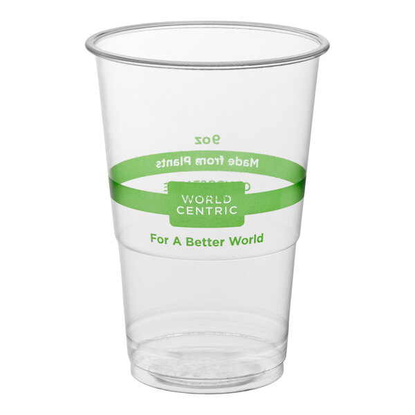 A clear 9 oz. compostable plastic cold cup with green branding and text, made by World Centric.