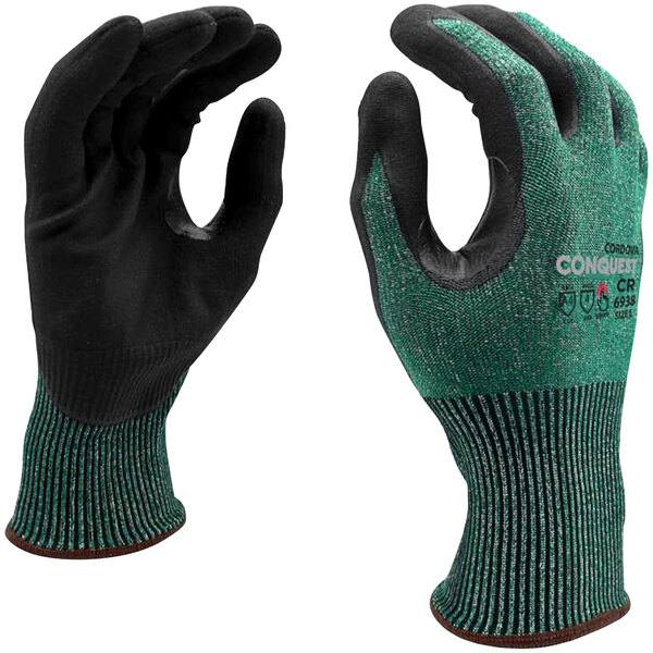 A pair of green Cordova Conquest gloves with black microfoam nitrile palms.