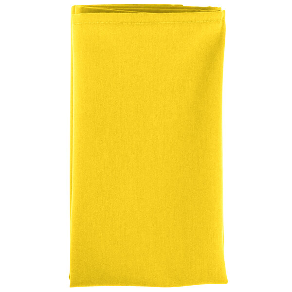 A folded yellow Intedge polycotton napkin.
