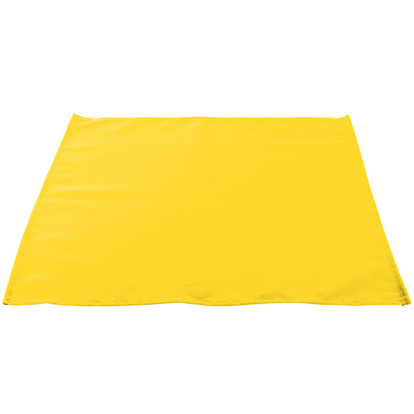 A yellow Intedge cloth napkin with a white edge.
