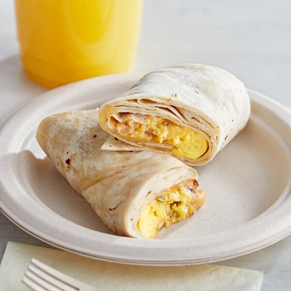 A plate of Don Miguel breakfast burritos with eggs.