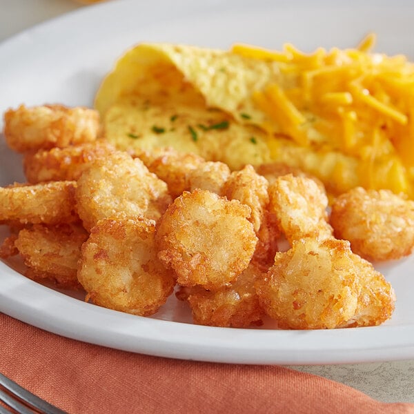 A plate of Tater Bucks on a table.