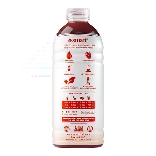 A white plastic bottle of Smartfruit Summer Strawberry Puree with red and white labels. The bottle is filled with red liquid.