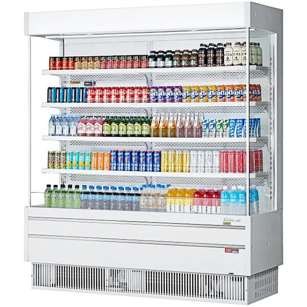 A white Turbo Air narrow depth vertical air curtain display case filled with drinks and beverages.