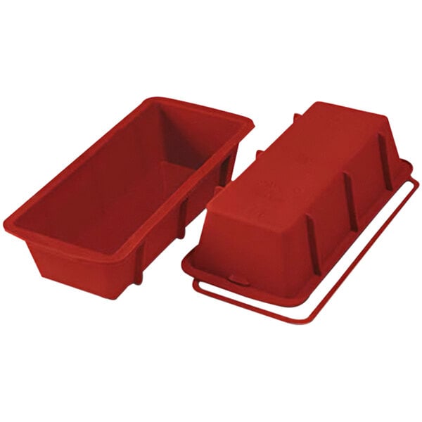 A red rectangular Silikomart silicone baking mold with a handle.