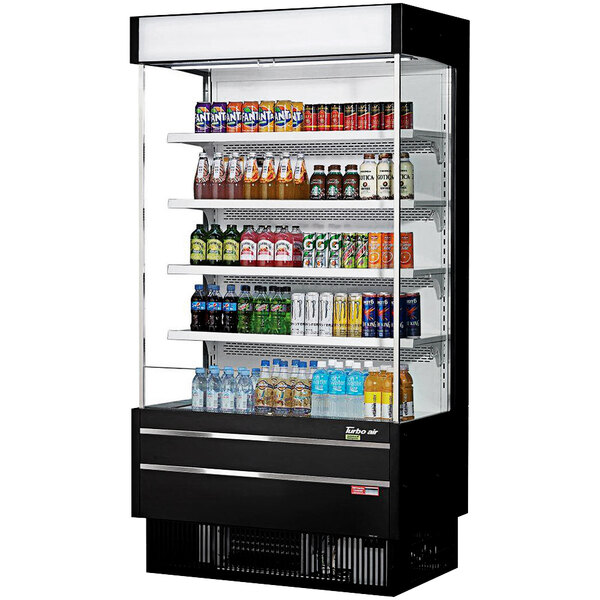 A black Turbo Air vertical air curtain display case with drinks and beverages.