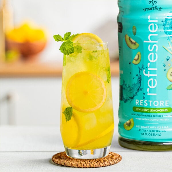 A bottle of Smartfruit Kiwi / Mint / Lemongrass refresher on a white background.