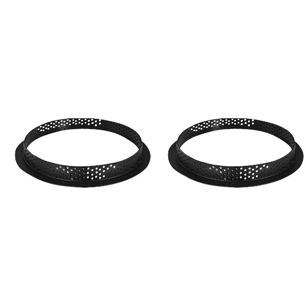 Two black circular Silikomart tart rings with holes.