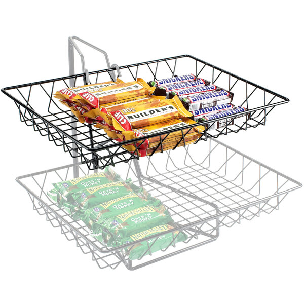 A black wire Cal-Mil tray with candy bars in it.