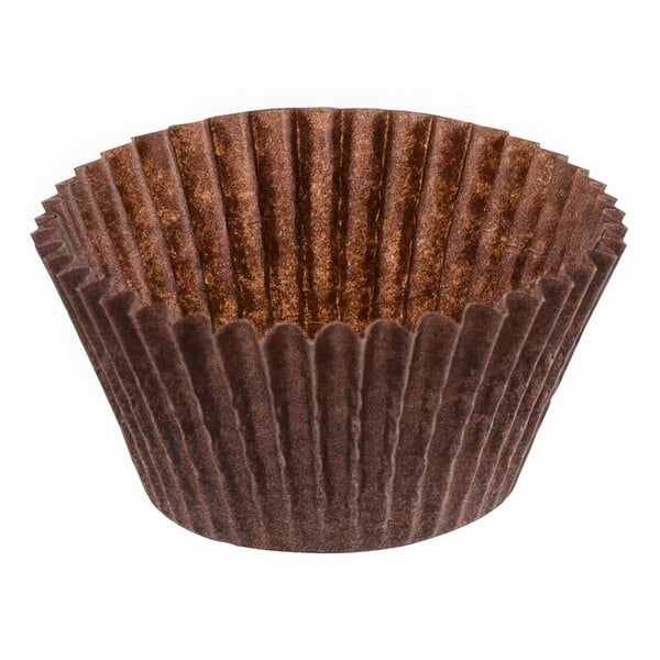 A close-up of a brown paper Novacart fluted baking cup on a white background.