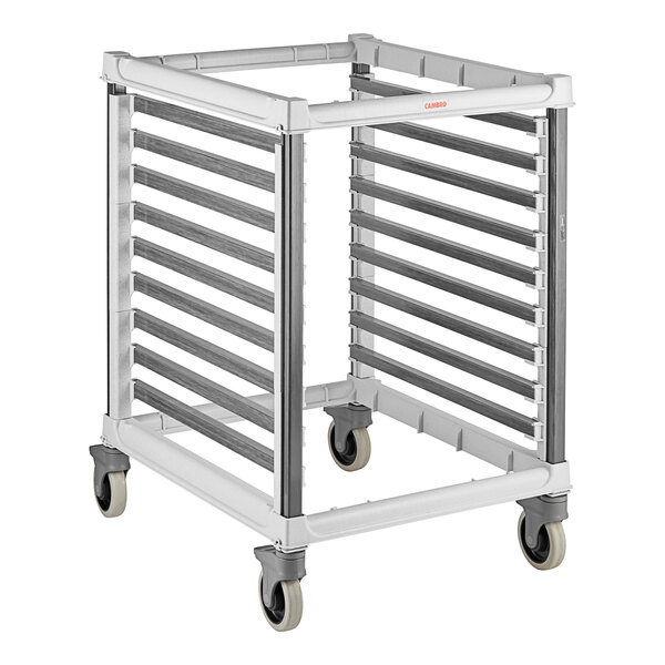 A white metal Cambro sheet pan rack with wheels.