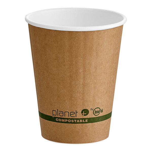 A brown Stalk Market Planet+ paper hot cup with a white rim.