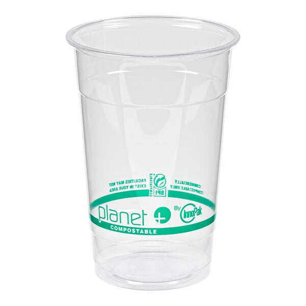 A clear plastic Stalk Market cup with a green label.