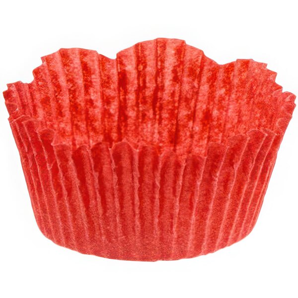 A red Novacart fluted cupcake wrapper.