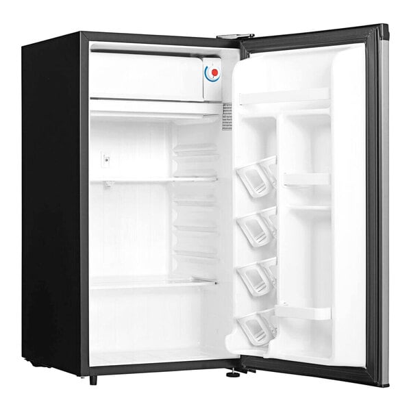 A stainless steel Danby reach-in refrigerator with its door open.