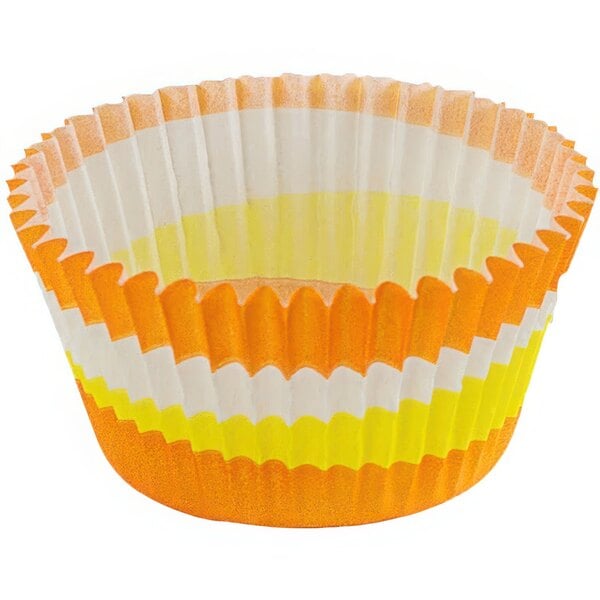 A Novacart cupcake wrapper with orange and white stripes.