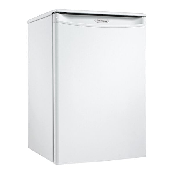 A small white Danby reach-in refrigerator with a handle.