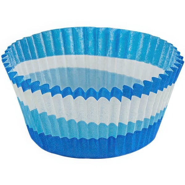 A close up of a blue and white fluted baking cup with a circle bottom.