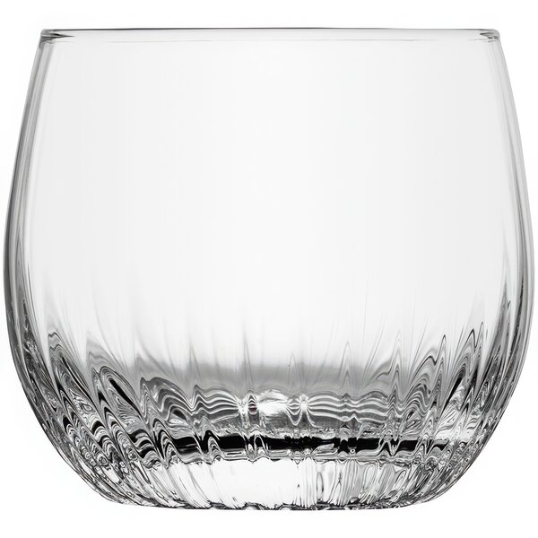 A clear Zwiesel Glas double old fashioned glass with a curved edge.