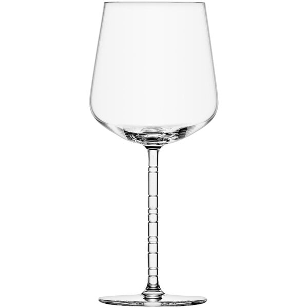 A close-up of a Schott Zwiesel clear wine glass with a stem.