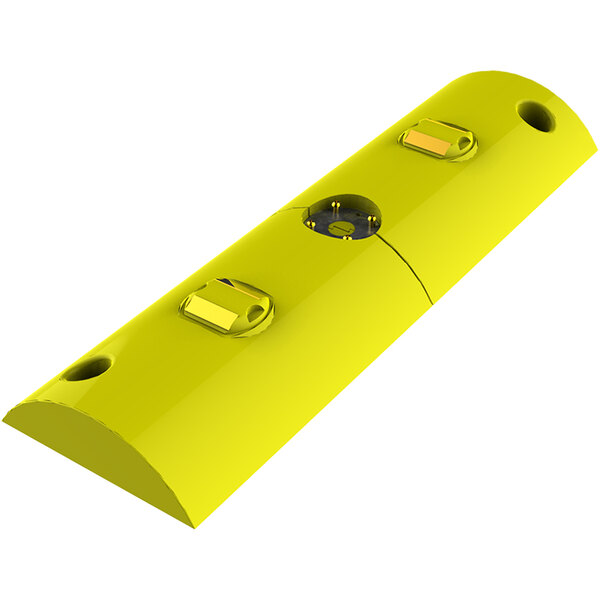 A yellow rectangular Tuff Curb with yellow reflectors and holes.